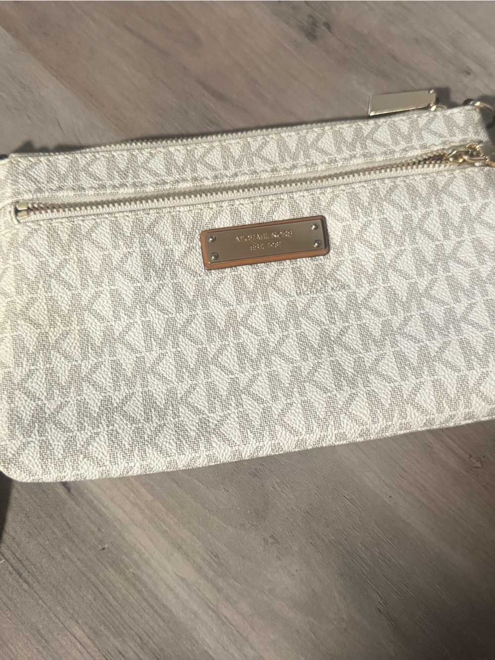 Michael Kors Ivory Signature Wristlet with Tan Strap